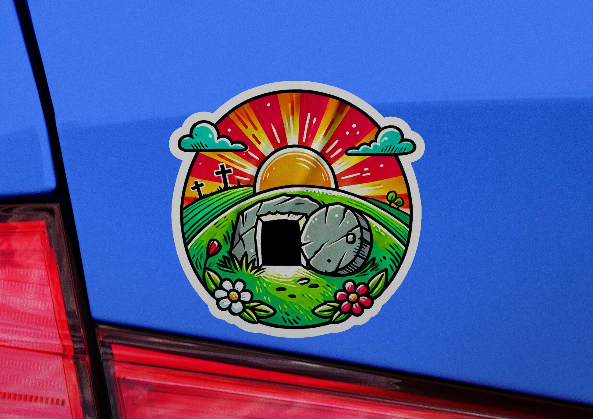 a car with a sticker of a rock in a field