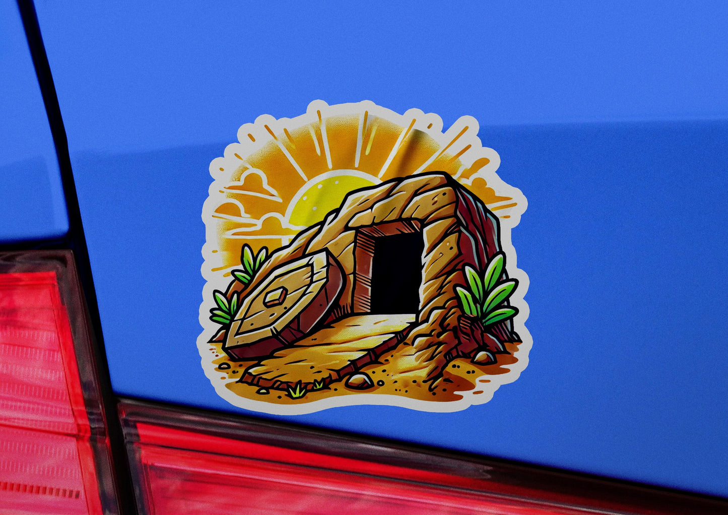 a sticker of a cave on the back of a car