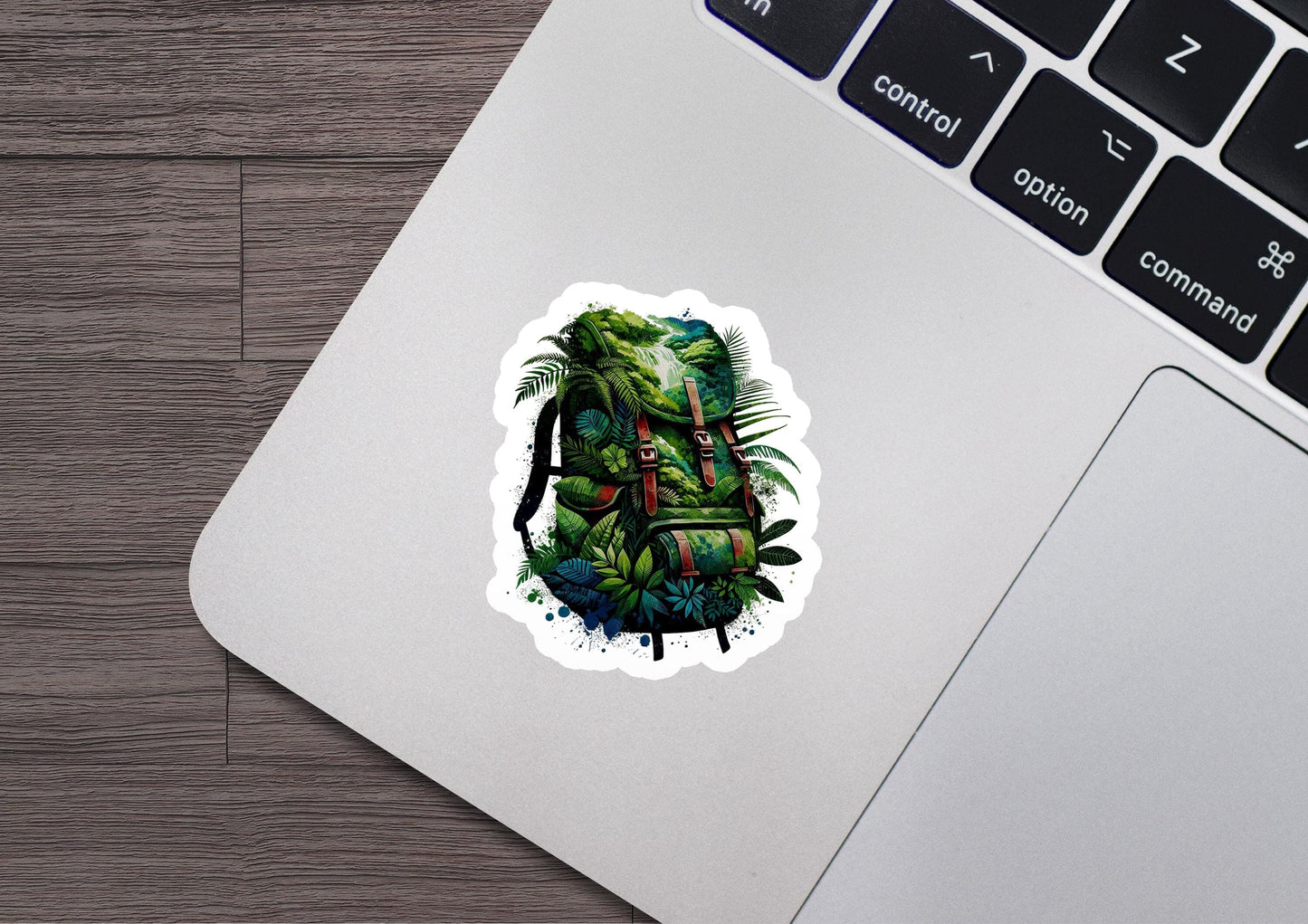 a laptop with a sticker of a backpack on it