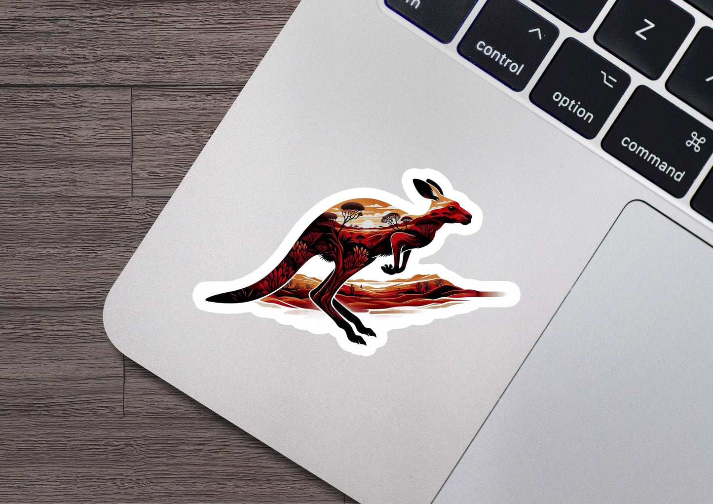 a sticker of a kangaroo on a laptop