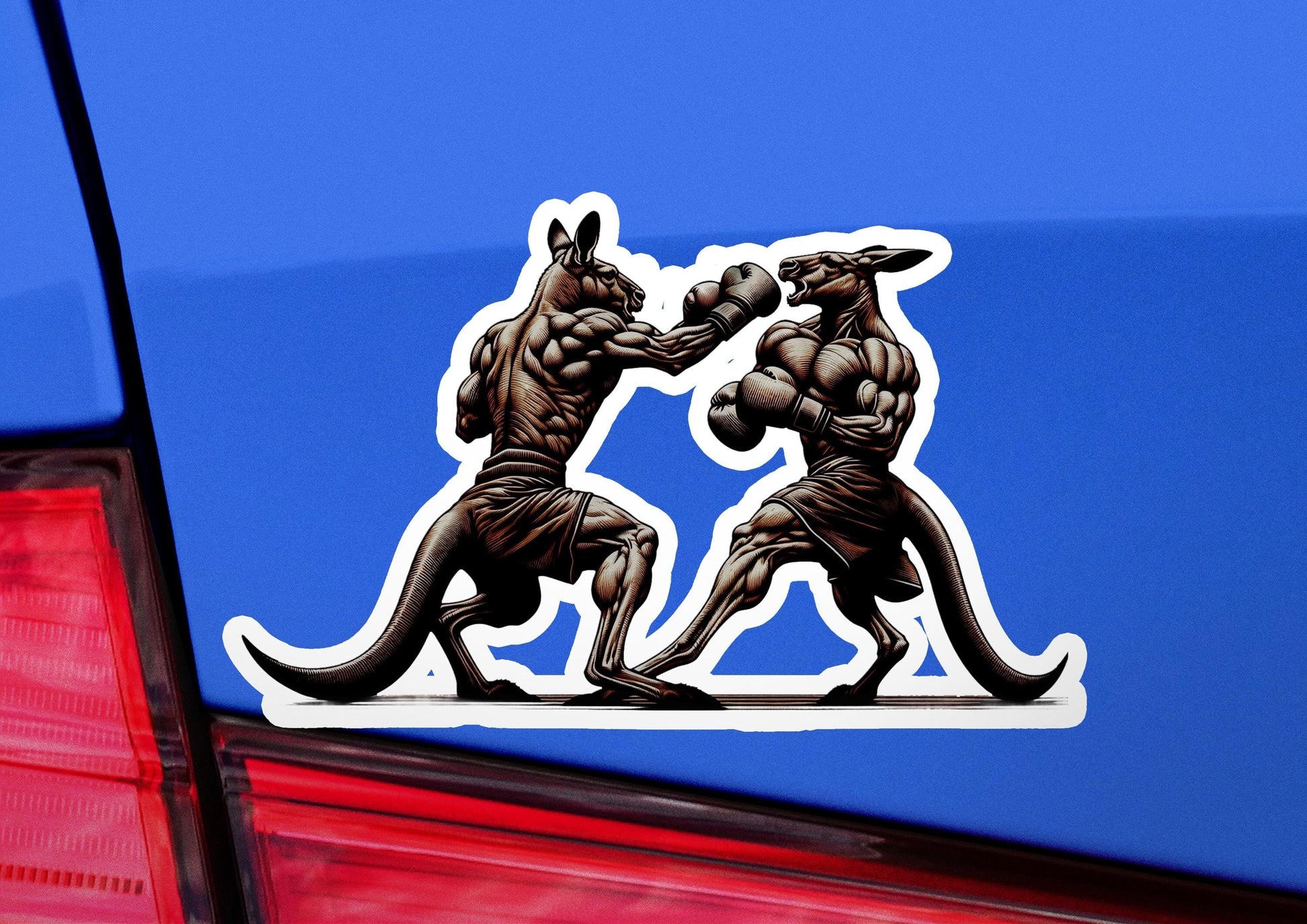 a sticker of two kangaroos on the back of a car
