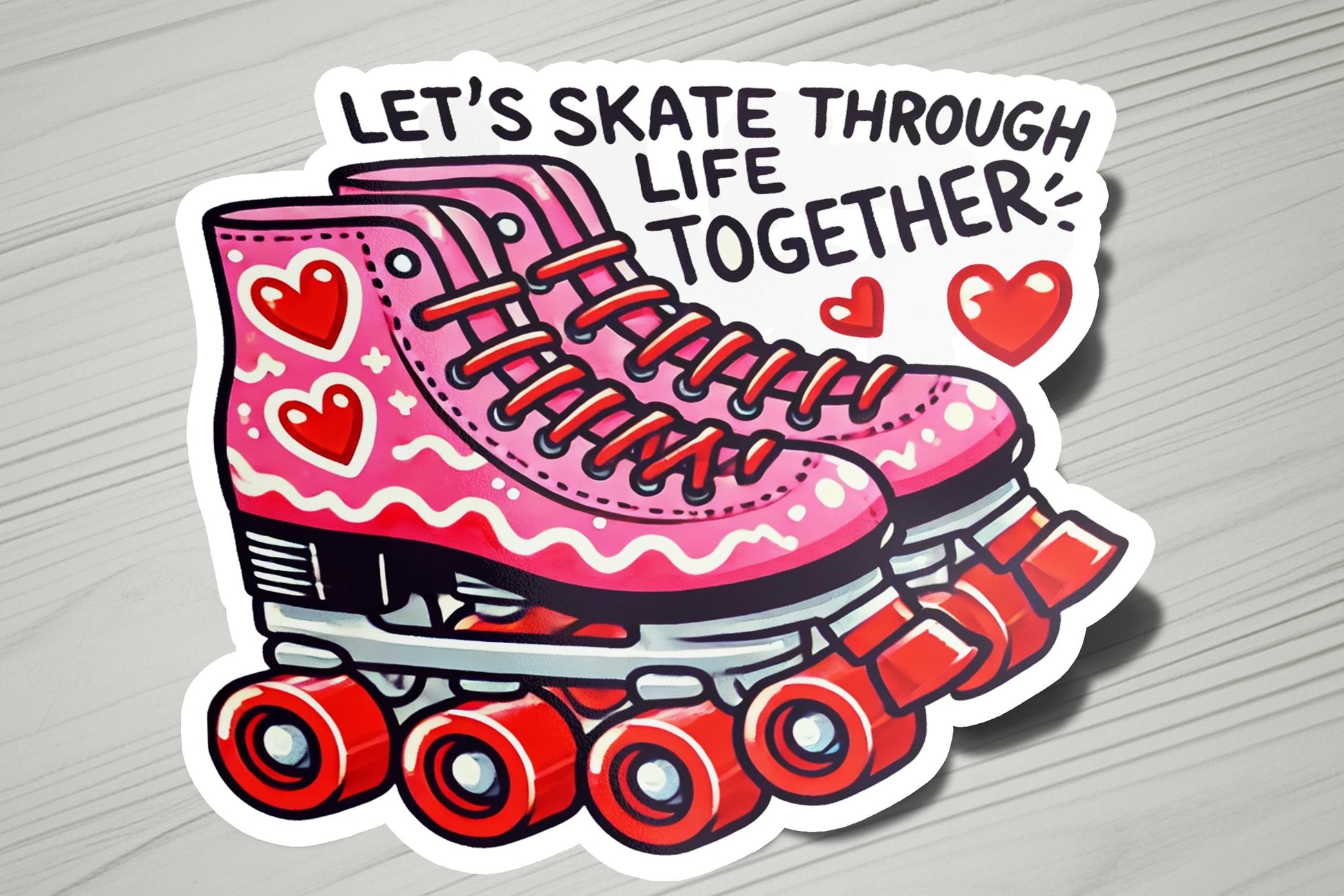 a pair of roller skates with hearts on them