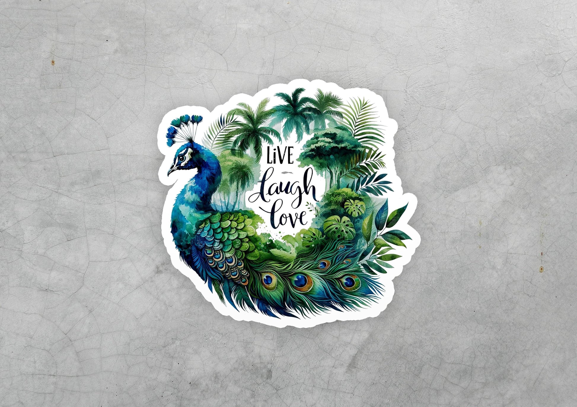 a sticker of a peacock with the words live laugh love