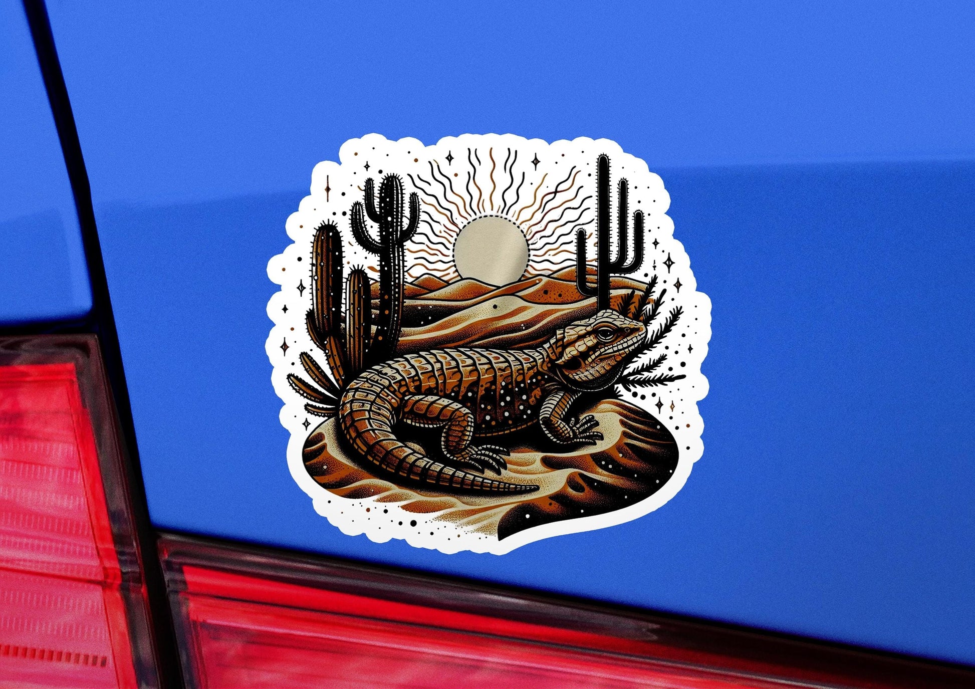 a sticker of a lizard on the back of a car
