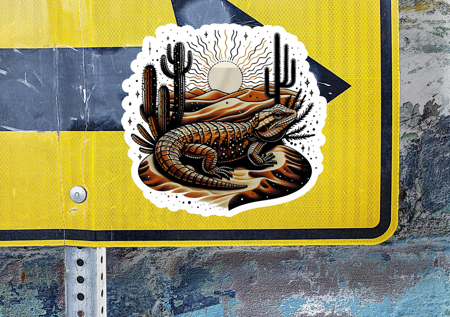 a sticker of a lizard on a road sign