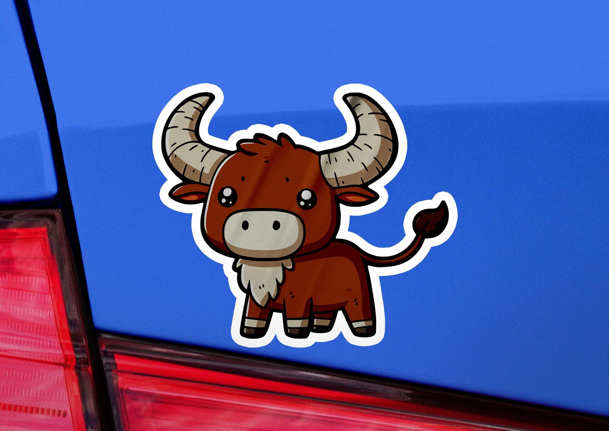 a bull sticker on the back of a car