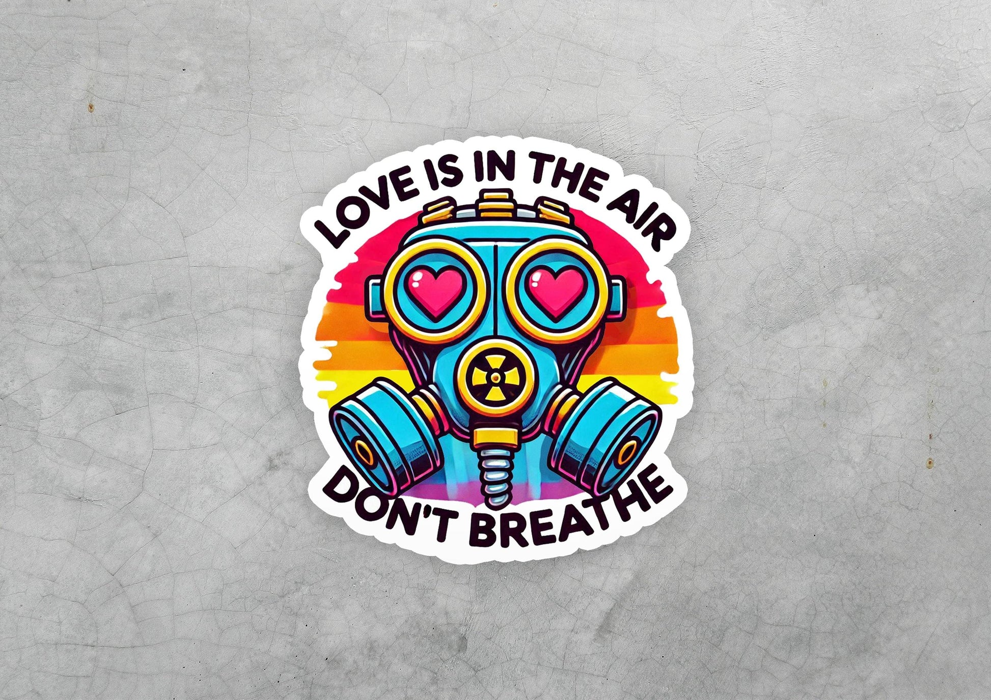 a sticker that says love is in the air don't breathe