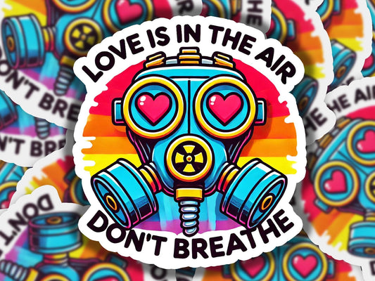 a sticker that says love is in the air don't breathe