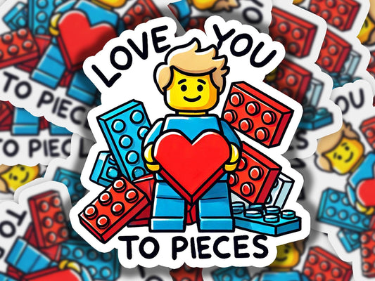 a sticker of a man holding a heart surrounded by legos