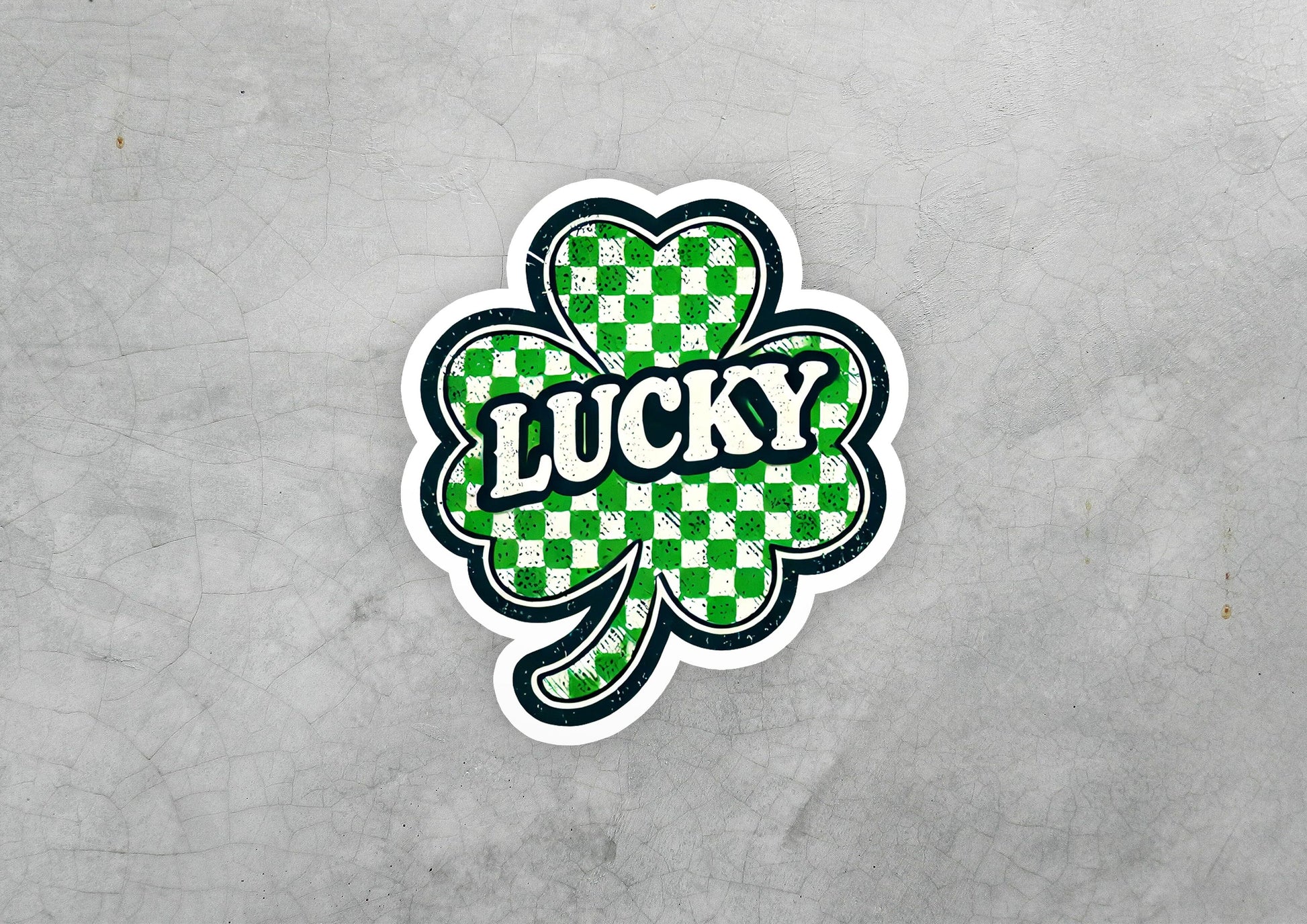 a sticker that says lucky with a four leaf clover
