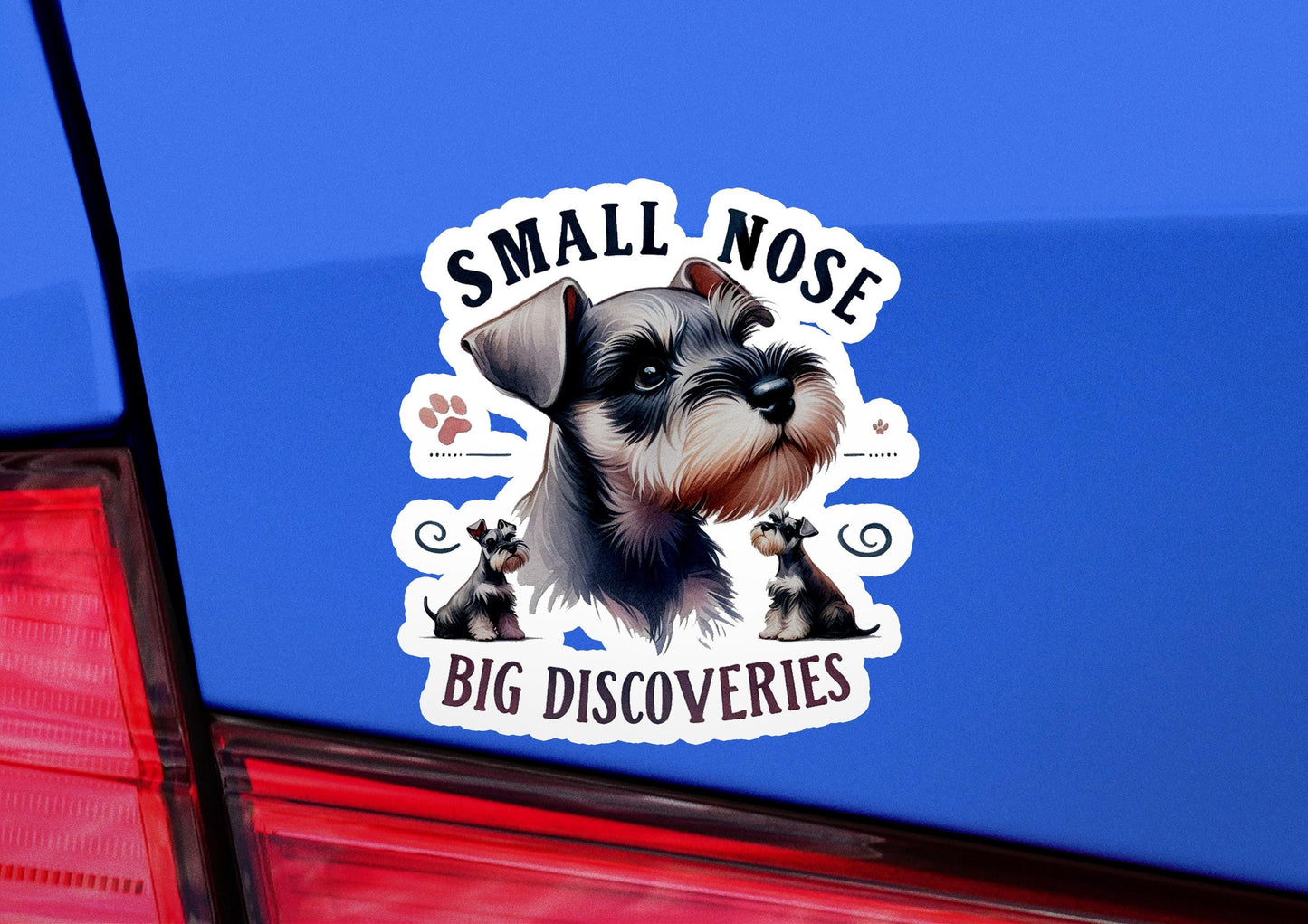 a small dog sticker on the back of a car