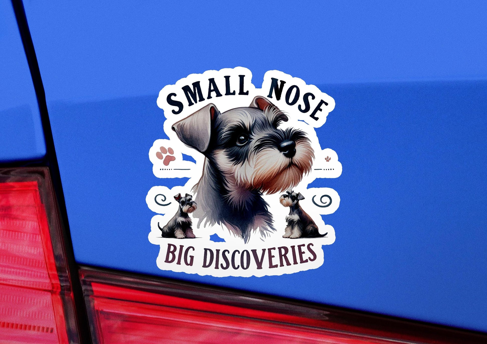 a small dog sticker on the back of a car