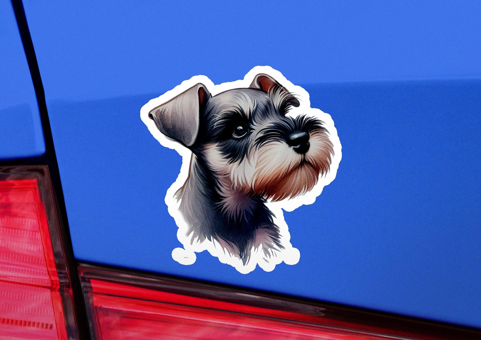 a dog sticker on the back of a car