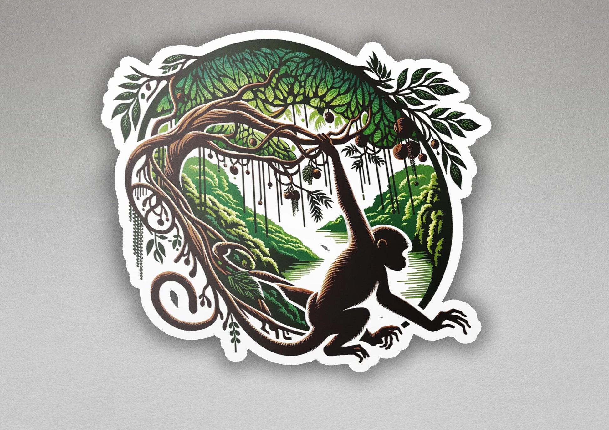 a sticker of a monkey hanging from a tree