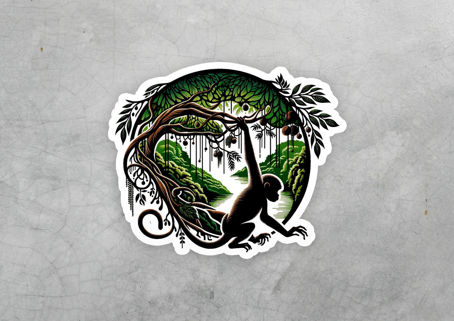 a sticker of a monkey hanging from a tree