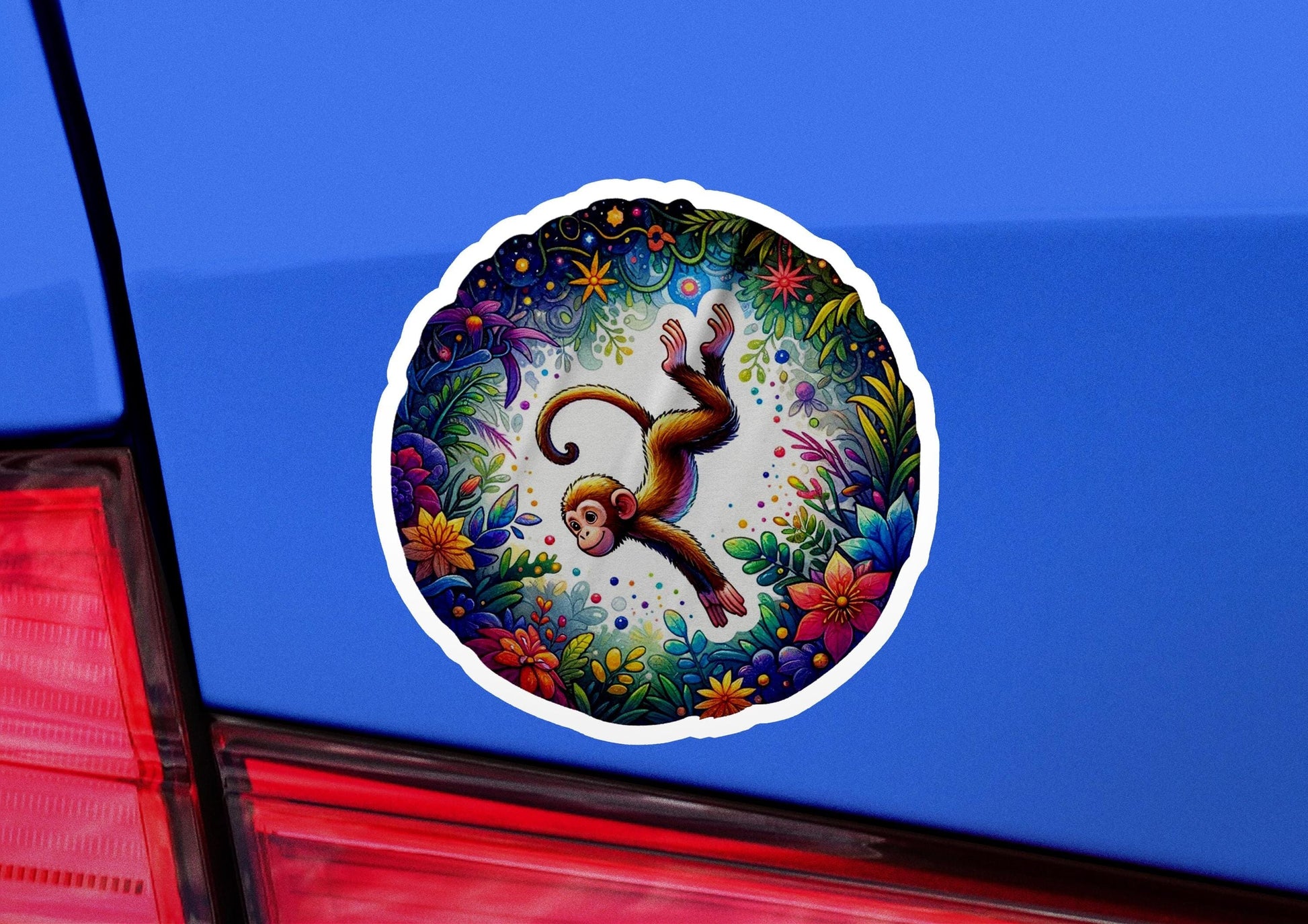a sticker of a monkey on the back of a car