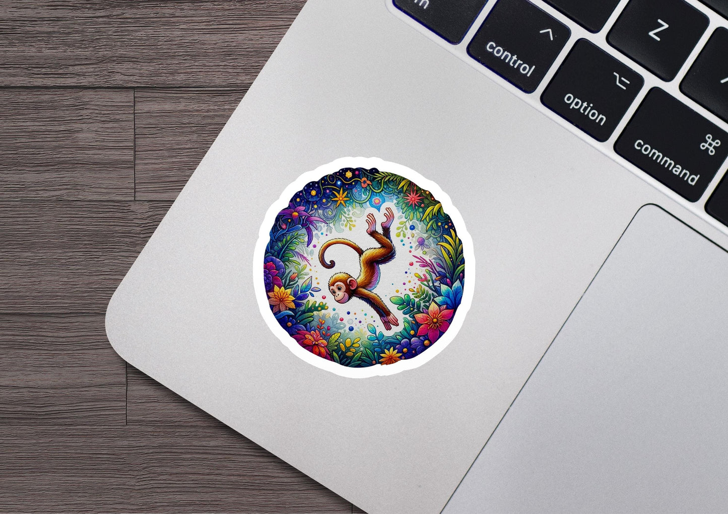 a sticker of a monkey on a laptop