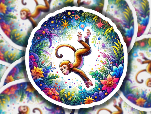 a sticker of a monkey hanging from a tree