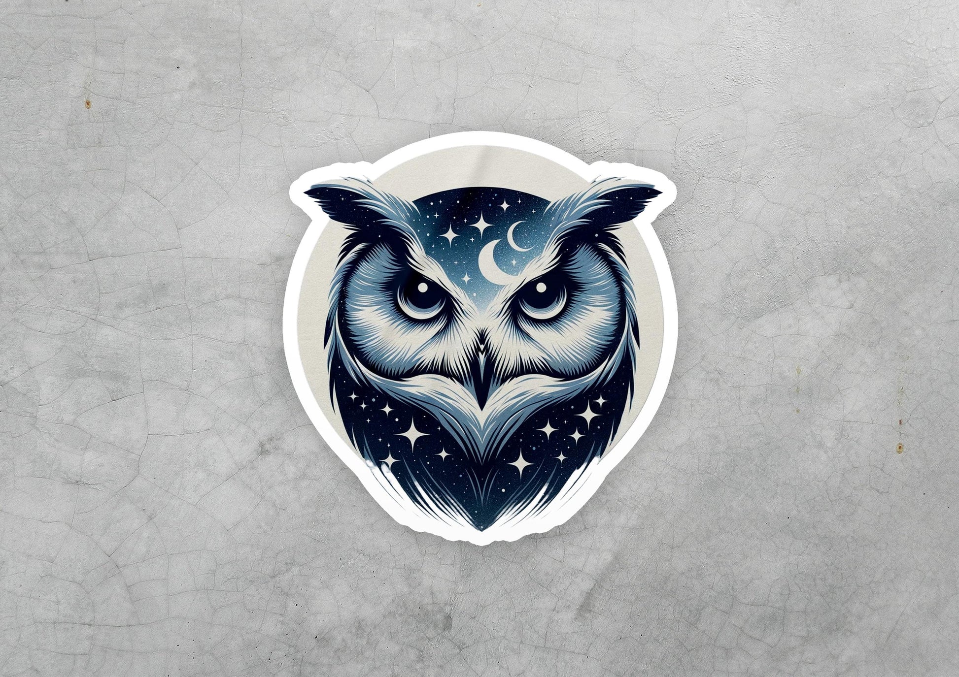 a sticker of an owl with stars and a moon