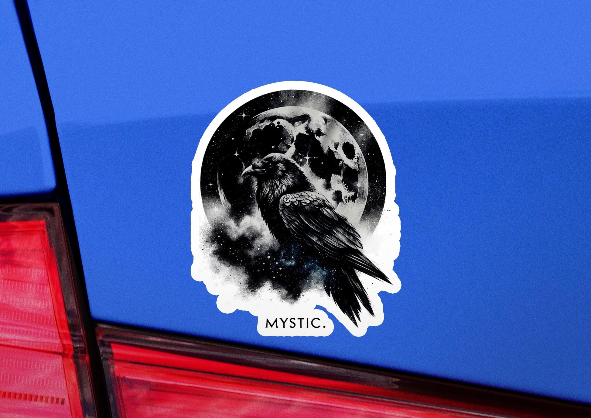 a car with a sticker of a crow on it