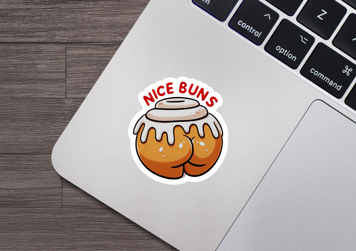 a sticker of a donut with the words nice buns on it