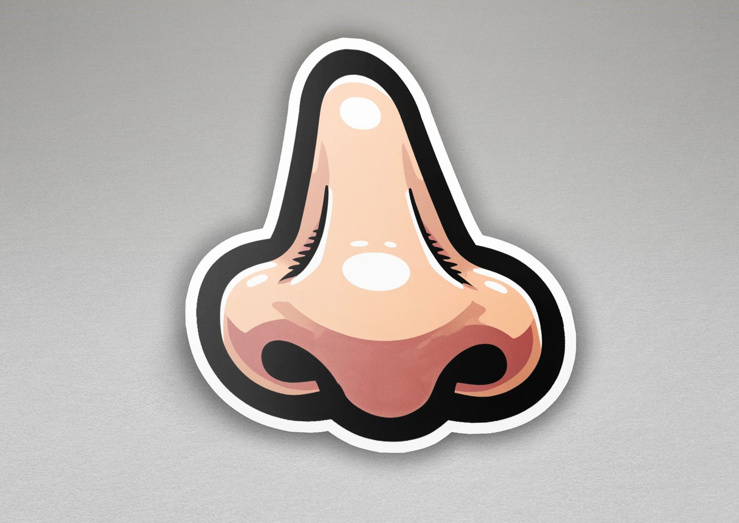a sticker of a nose on a gray background