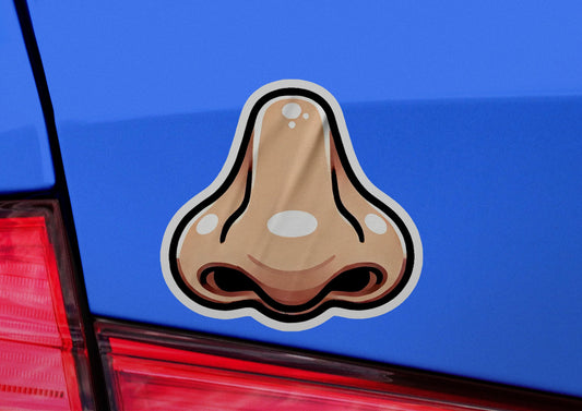 a close up of a car with a sticker of a nose