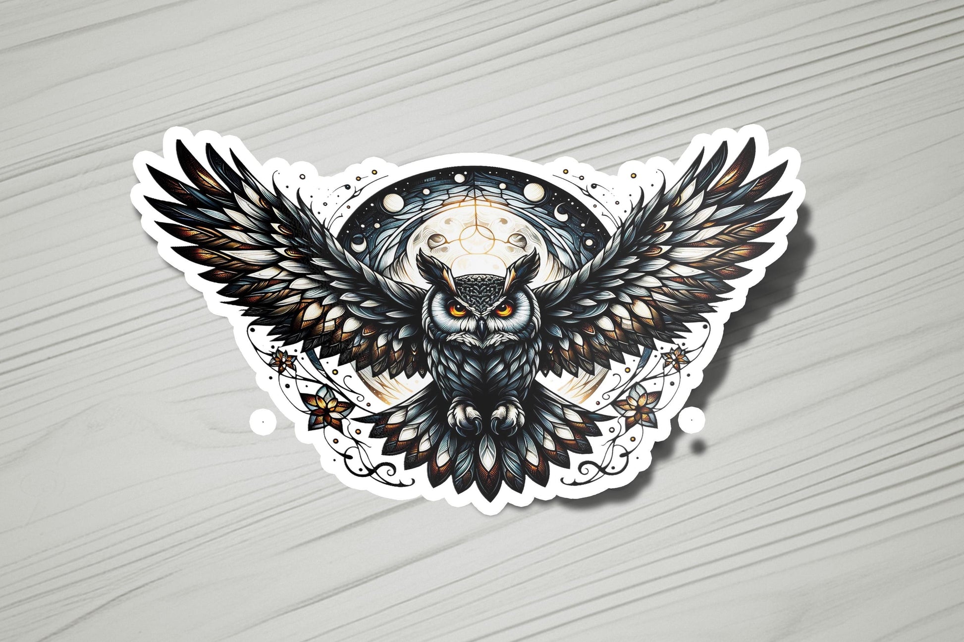 a sticker of an owl with a skull on it