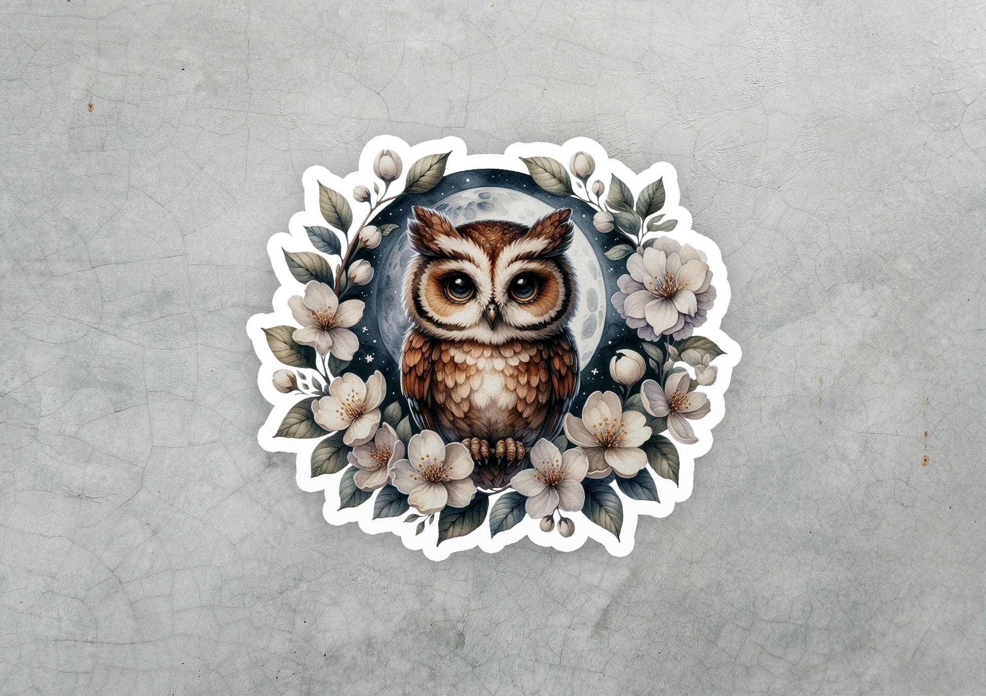 a sticker of an owl surrounded by flowers