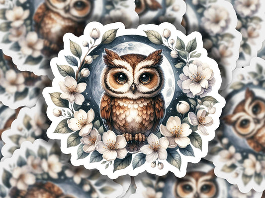 a picture of an owl surrounded by flowers