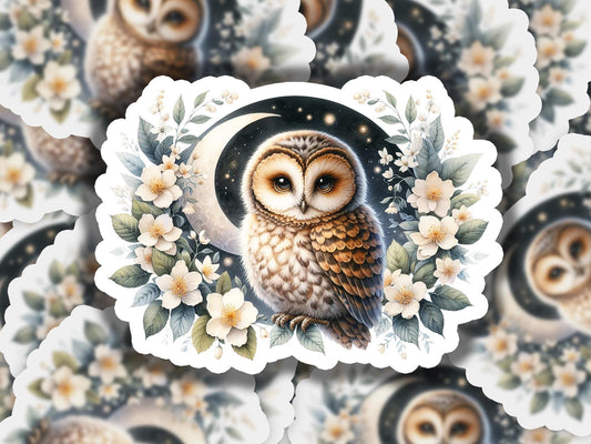 a picture of an owl sitting on a flowered branch