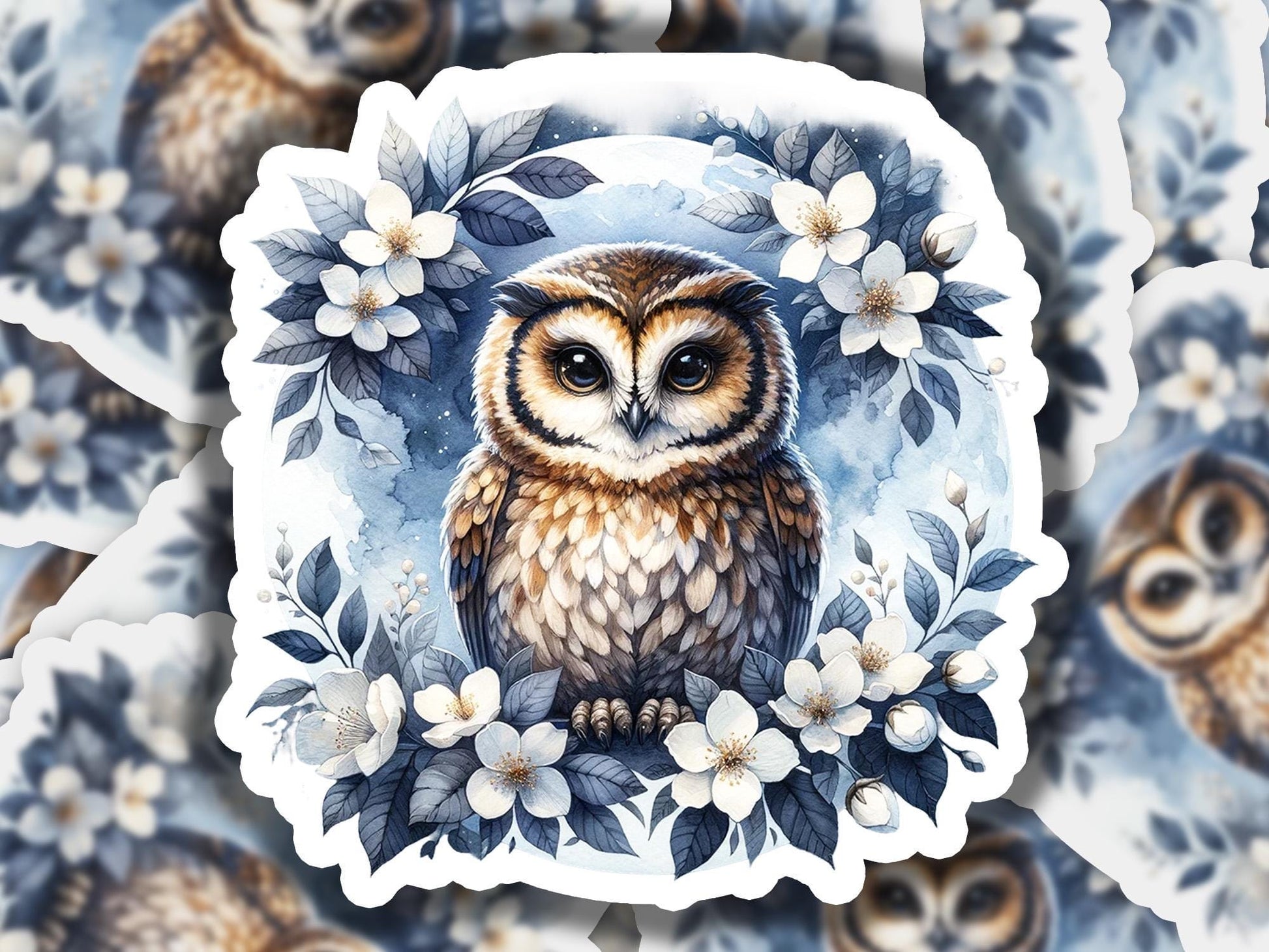a picture of an owl surrounded by flowers