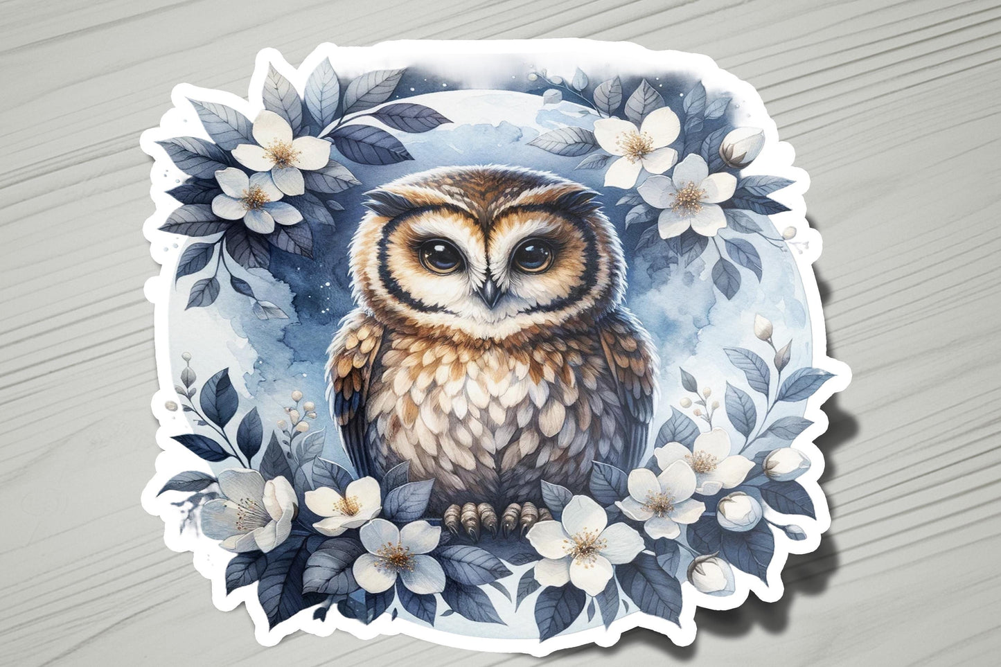 a sticker of an owl sitting on top of a table