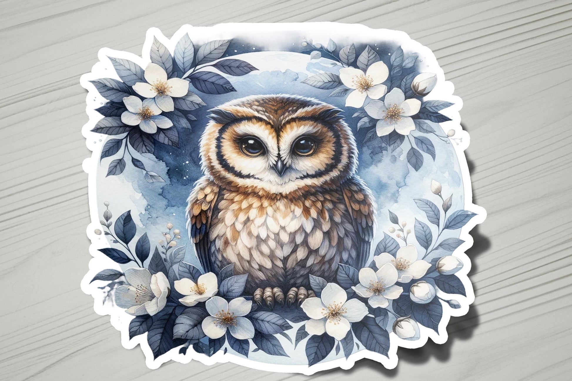 a sticker of an owl sitting on top of a table