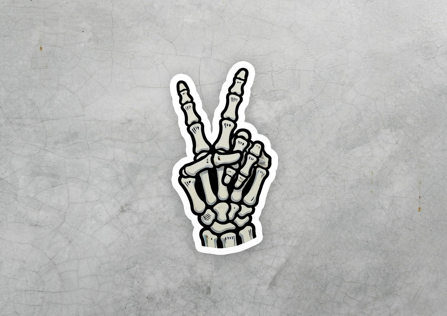 a sticker of a hand making the peace sign