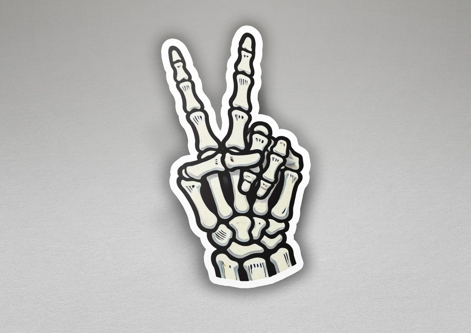 a sticker of a hand making the peace sign