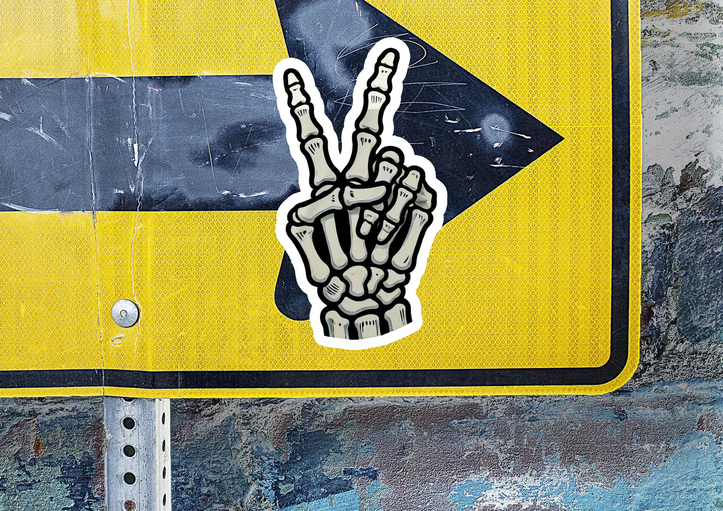 a yellow and black sign with a peace sign painted on it