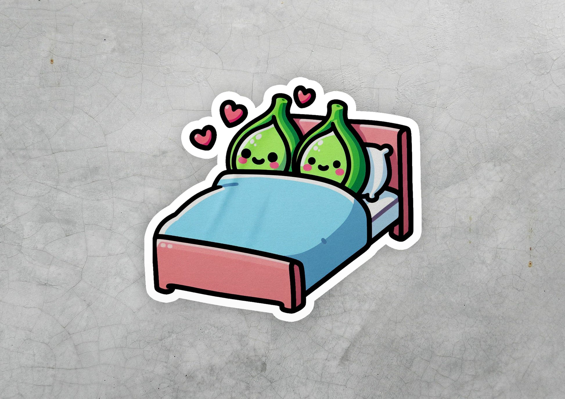 a sticker of a bed with two pillows