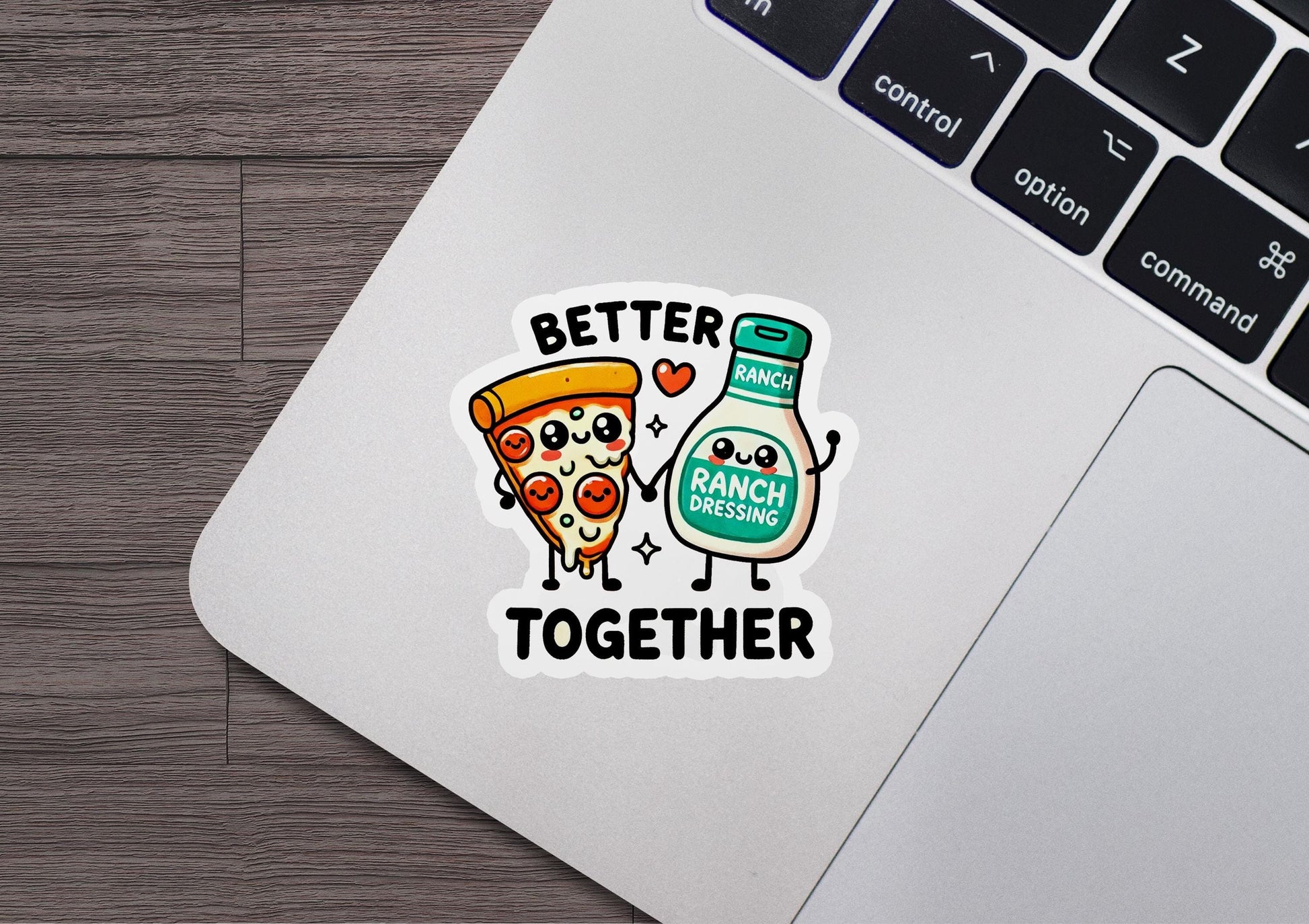 a laptop with a sticker of a bottle and a slice of pizza