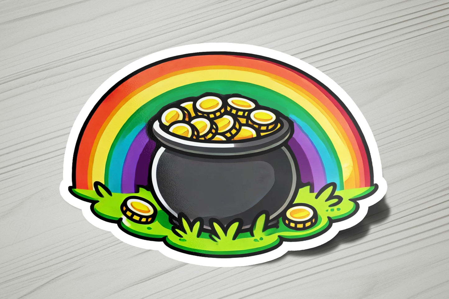a sticker of a pot of gold on a rainbow