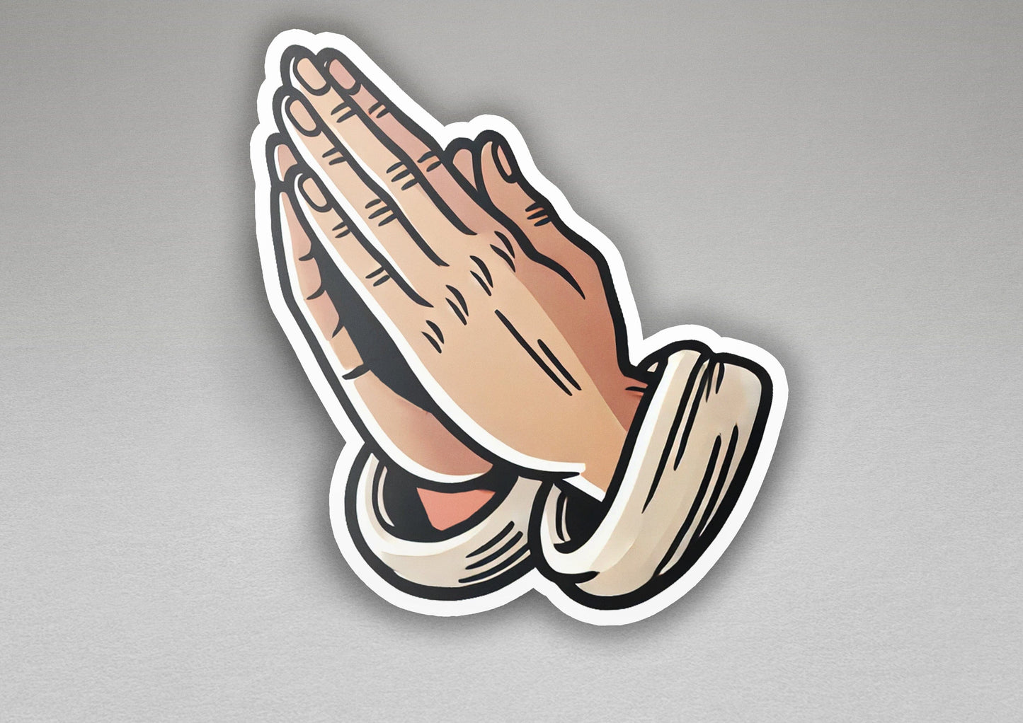 a sticker of a praying hand on a gray background
