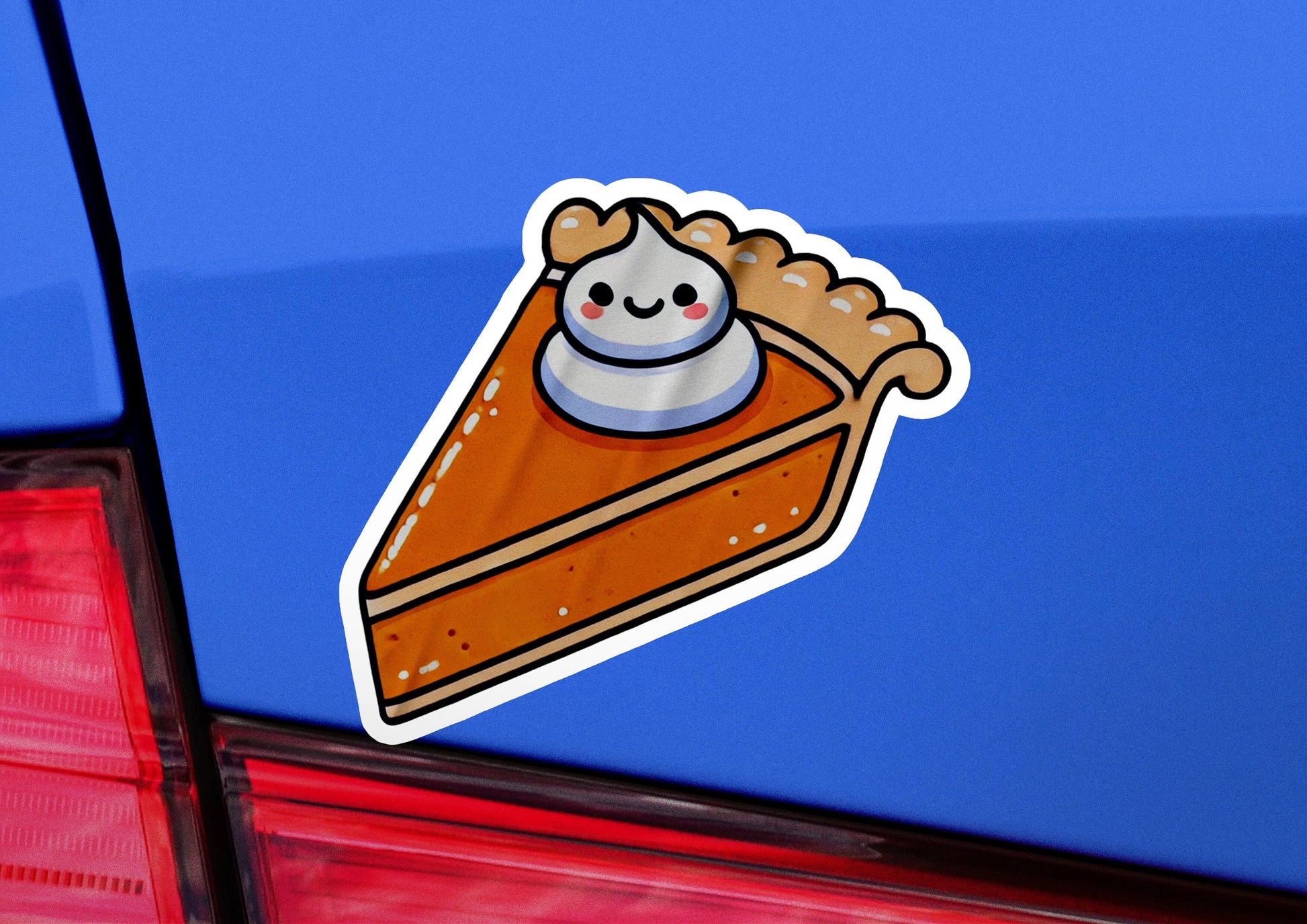 a sticker of a piece of pie on the back of a car