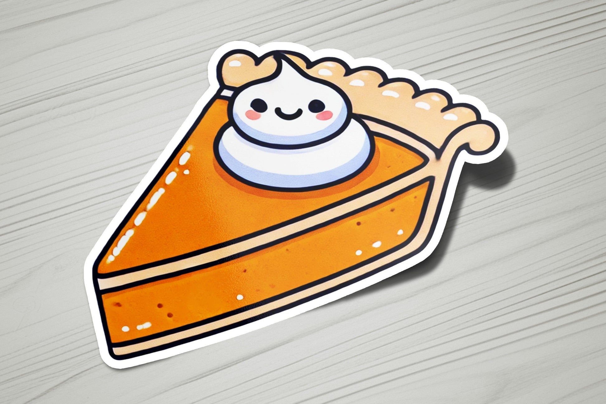 a sticker of a slice of pie with a smiling face