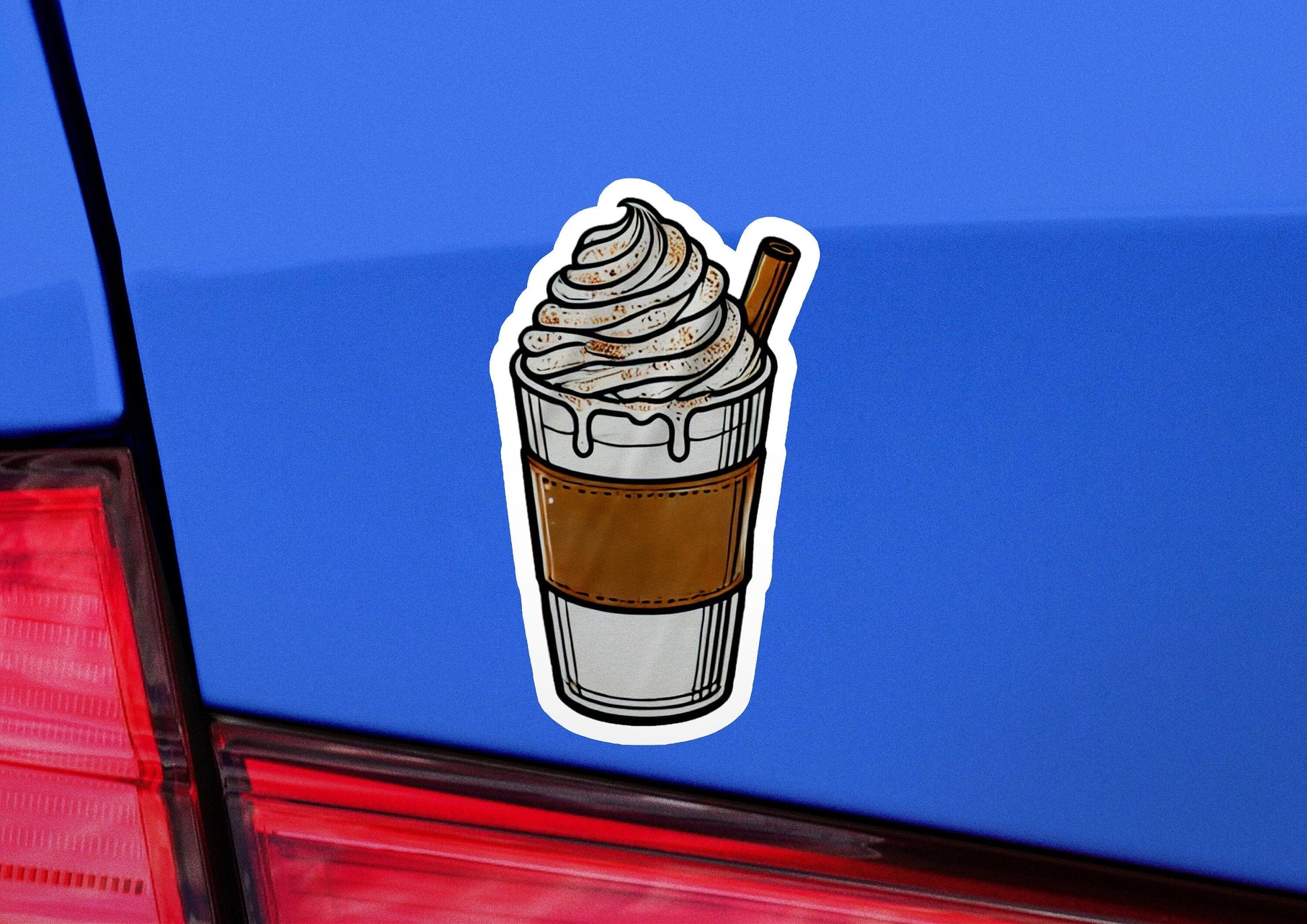 a sticker of a cup of coffee on the back of a car