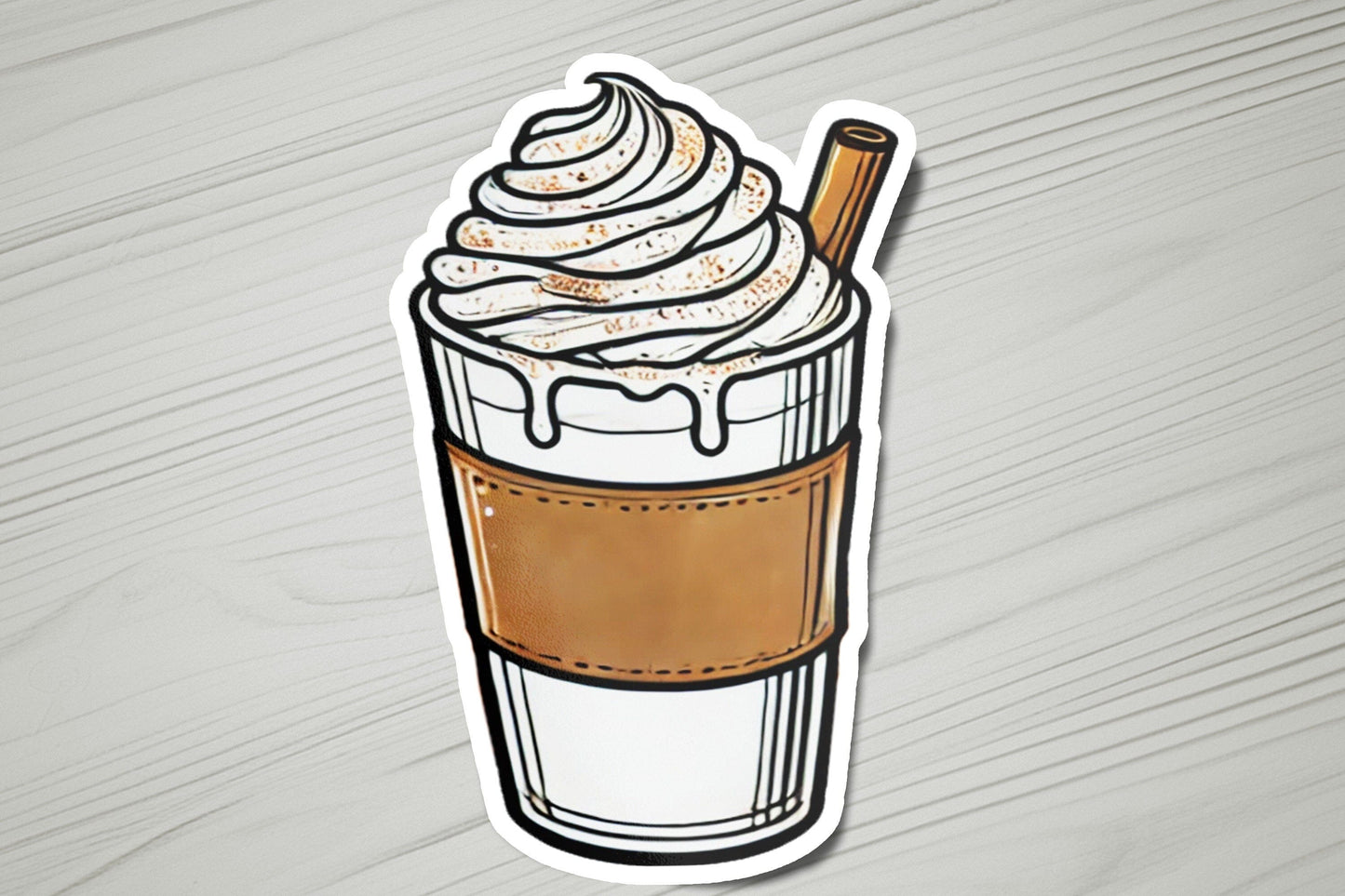 a sticker of a cup of coffee with whipped cream