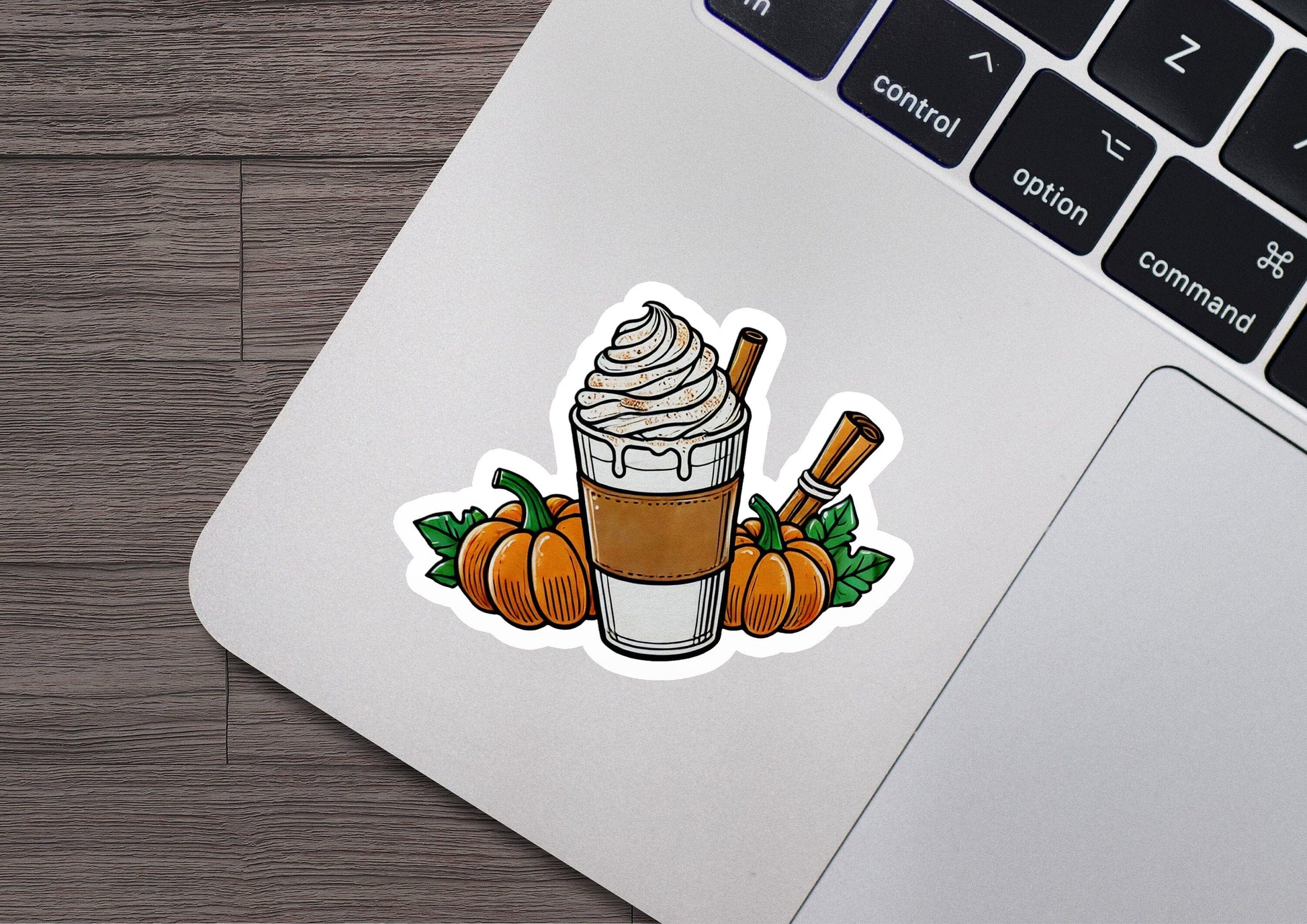a sticker of a cup of coffee on a laptop