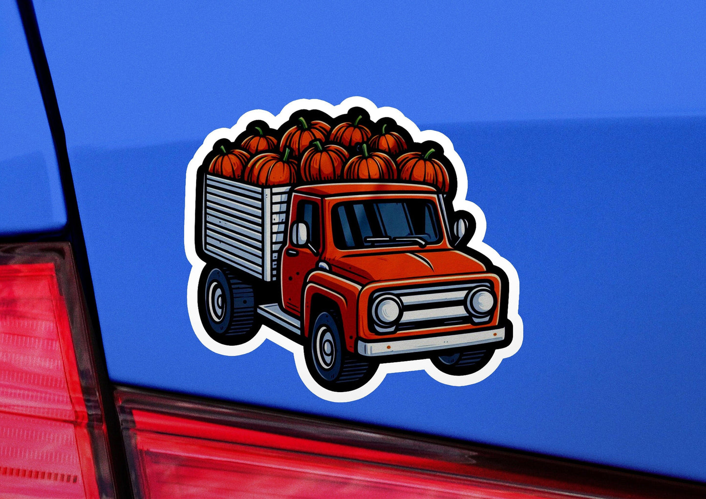 a truck with pumpkins on the back of it