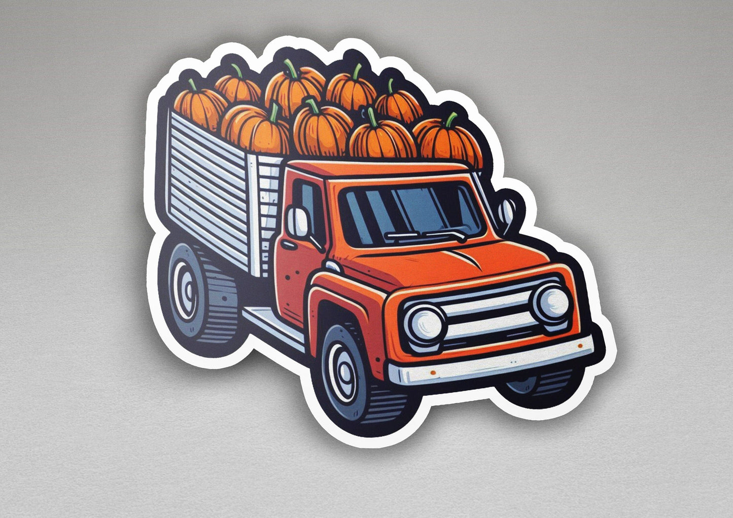 a sticker of a truck filled with pumpkins