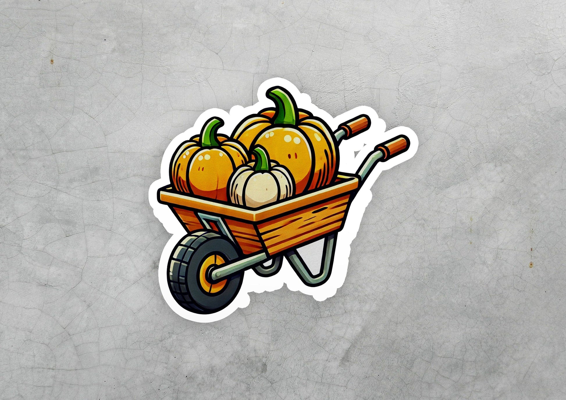 a sticker of a wheelbarrow filled with pumpkins