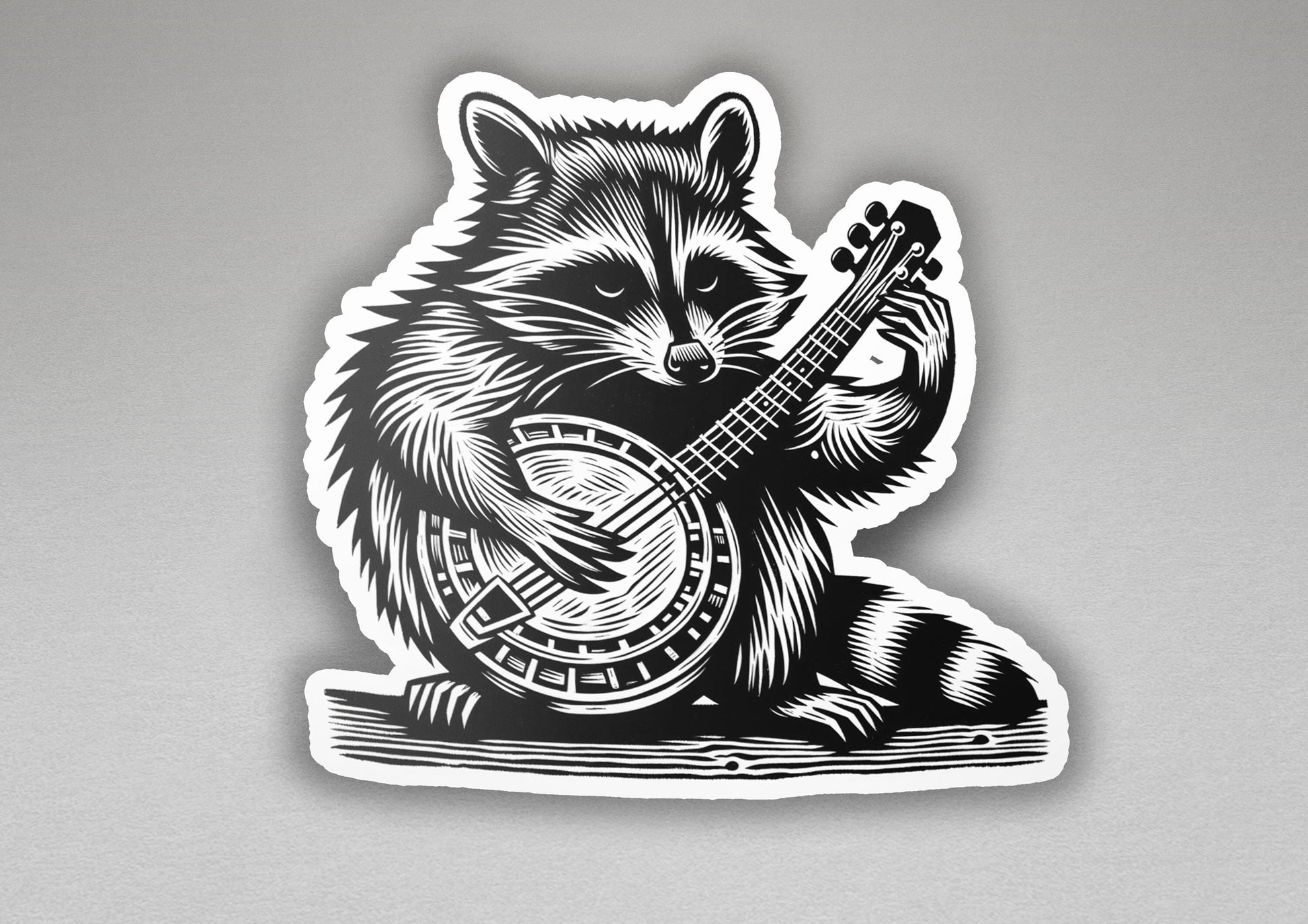 a sticker of a raccoon playing a guitar
